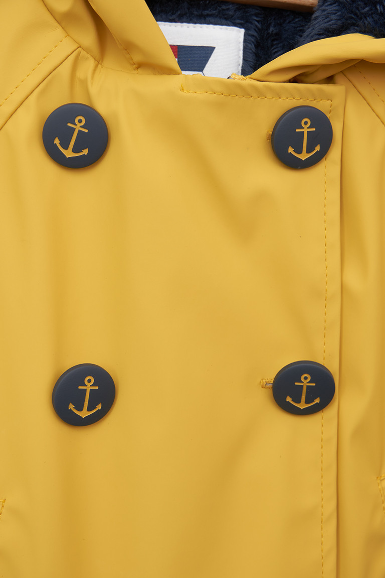 C3151 Chubasquero botones anclas amarillo