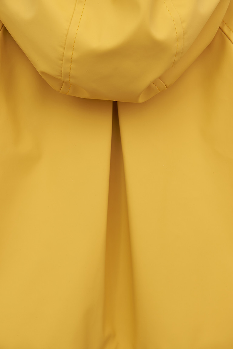 C3151 Chubasquero botones anclas amarillo